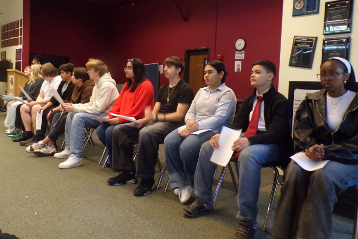 Stage Face! Lucas Verbeurgt, Milana Polivoda, Jacob Verbeurgt, Anthony Ramos, Morgan Henderson, Heinrich Schulz, Bareera Rai, Michael Gasanov, Sana Frozan, Timothy Pinkevich, and Love Ndungu sit at the front, awaiting for their turn to speak in front of the school for the ASB elections. This event was held on April 21, where the votes would be revealed the following morning.
